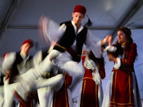 Scott Sommerdorf   |  The Salt Lake Tribune
The Parthenon Dancers perform a fast paced dance at the Greek Festival, Saturday, September 6, 2014.