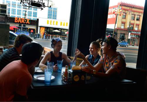 Scott Sommerdorf   |  The Salt Lake Tribune
Friends eat at Este' in the Edison Quarter enclave, Thursday, August 21, 2014. From left to right; Sam Teng, Nick Robison, Marissa Lindley, Lindsey Jones, and William Crosland.