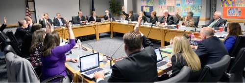 Al Hartmann  |  The Salt Lake Tribune
A majority of members of the Utah State Board of Education vote to swear in Brad Smith as the new state superintendent of public instruction during Friday's meeting in Salt Lake City.