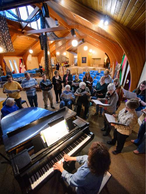 Trent Nelson  |  The Salt Lake Tribune
An interfaith choir, accompanied by Mary Lou Prince, rehearses at the South Valley Unitarian Universalist Society in Salt Lake City, Thursday October 30, 2014. in preparation for a performance on November 7 at the LDS Assembly Hall on Temple Square. The choir blends Unitarian Universalists and LDS singers to perform the cantata, "Songs of the Earth."