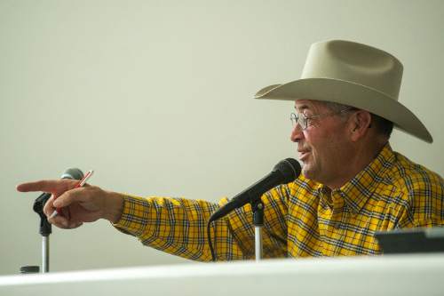 Chris Detrick  |  The Salt Lake Tribune
Auctioneer Lane Parker calls out bids during the 10th annual Antelope Island live bison auction Saturday November 8, 2014. Over 200 bison were auctioned today.