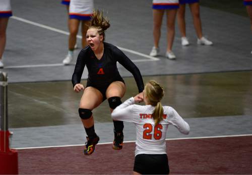 Scott Sommerdorf  |  The Salt Lake Tribune
Timpview's Annie Hofheins jumps as she celebrates a point during the third set as Timpview defeated Sky View 3-0 in their 4A volleyball championship match at UCCU, Saturday, November 8, 2014 in Provo.