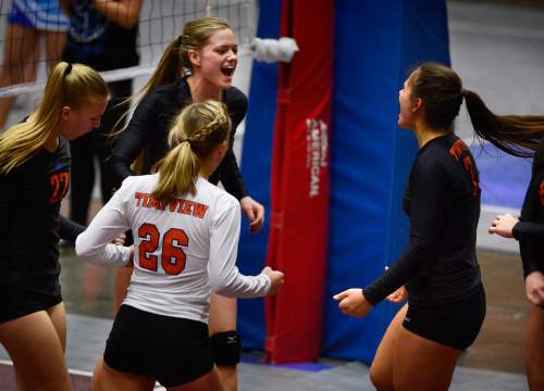 Scott Sommerdorf  |  The Salt Lake Tribune
Timpview celebrates their win in the first set. Timpview beat Sky View 25-23 in the first set of their 4A volleyball championship match at UCCU, Saturday, November 8, 2014 in Provo.