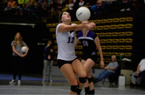 Scott Sommerdorf  |  The Salt Lake Tribune
Jaquelyn Langhaim saves a ball as Pleasant Grove defeated Lehi 25-21 to take the first set of their 5A volleyball championship match at UCCU, Saturday, November 8, 2014.