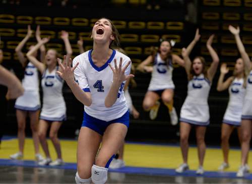 Scott Sommerdorf  |  The Salt Lake Tribune
Whitney Anderson of Pleasant Grove celebrates as the Vikings defeated Lehi 25-21 to take the first set of their 5A volleyball championship match at UCCU, Saturday, November 8, 2014.