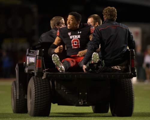 Rick Egan  |  The Salt Lake Tribune

Utah Utes wide receiver Tim Patrick (9) tries to rally his team as he is taken off the field, after being injured in the 3rd quarter, in PAC-12 action, Utah vs. Oregon game, at Rice-Eccles Stadium, Saturday, November 8, 2014