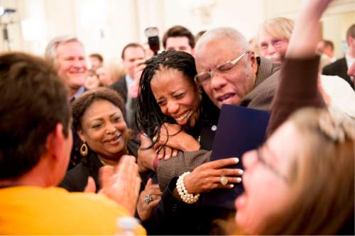 Jeremy Harmon  |  The Salt Lake Tribune

Mia Love gets a hug from her father after she beat opponent Doug Owens in the race for Utah's 4th Congressional District, Tuesday November 4, 2014.