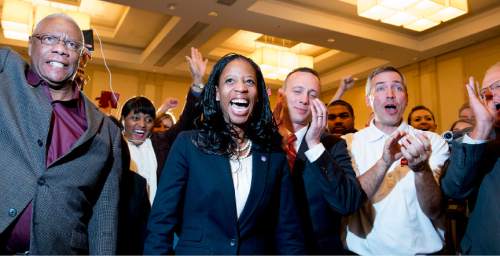 Steve Griffin  |  The Salt Lake Tribune

Mia Love celebrates with family and supporters after defeating opponent Doug Owens in the race for Utah's 4th Congressional District, Tuesday November 4, 2014.