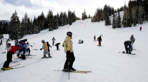 Steve Griffin  |  The Salt Lake Tribune

Skiers and snowboarders enjoy the President's Day holiday at Solitude Ski Resort  Monday Feb 16, 2009.