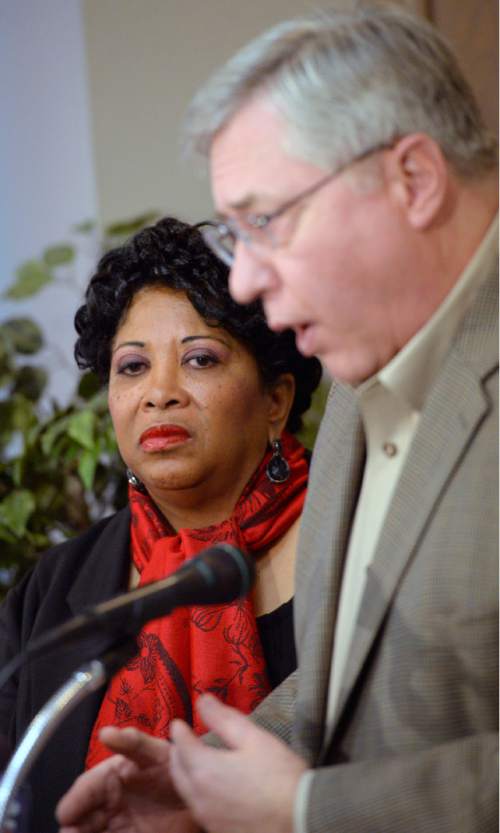 Al Hartmann  |  The Salt Lake Tribune
Jeanetta Williams of the Salt Lake branch of NAACP, left, holds a press conference in Salt Lake City Monday Nov. 10, 2014, with attorneys Robert Sykes and Scott Evans to ask the U.S. Justice Department to investigate the Sept. 10 shooting death of 22-year-old Darrien Hunt -- who was black -- by two Saratoga Springs police officers.