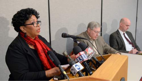 Al Hartmann  |  The Salt Lake Tribune
Jeanetta Williams of the Salt Lake branch of NAACP, left, holds a press conference in Salt Lake City Monday Nov. 10, 2014, with attorneys Robert Sykes and Scott Evans to ask the U.S. Justice Department to investigate the Sept. 10 shooting death of 22-year-old Darrien Hunt -- who was black -- by two Saratoga Springs police officers.