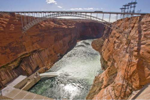 Paul Fraughton  | Tribune file photo
Valves at the base of the Glen Canyon Dam are opened in March 2008.