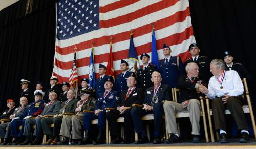 Francisco Kjolseth  |  The Salt Lake Tribune
The University of Utah holds its annual Veterans Day ceremony as it honors 11 Utah veterans during a ceremony at the Olpin Union Building which was followed by a 21-cannon salute.