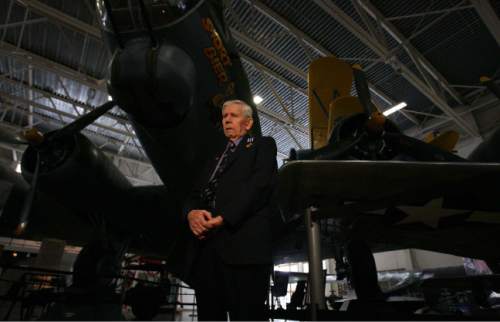 Leah Hogsten  |  The Salt Lake Tribune
Retired Sgt. Paul V. Sersland of Layton stands in front of a B-17 bomber and  talks of his service as an aerial gunner on a B-17 and the 35 bombing raids he completed over Europe from October 1944 to March 1945. 
A Distinguished Flying Cross Medal presentation was awarded to retired Sgt. Paul V. Sersland from Layton and posthumously to 2nd Lt. Evan E. Allan Friday February 25, 2011,  at the Lindquist-Hadley Fighter Gallery in the Hill Aerospace Museum. Major General Andrew E. Busch, Ogden Air Logistics Center commander, and former U.S. Senator Robert Bennett presented the awards.