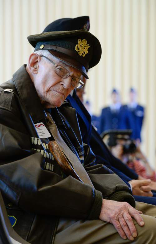 Francisco Kjolseth  |  The Salt Lake Tribune
World War II veteran Kenneth B. Hancock who used to fly B-25 Mitchell bombers is announced before taking the stage for a ceremony at the University of Utah where 11 Utah veterans were honored.