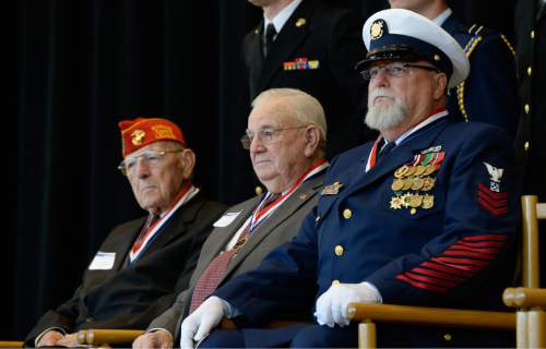 Francisco Kjolseth  |  The Salt Lake Tribune
The University of Utah holds its annual Veterans Day ceremony as it honors 11 Utah veterans, including William "Bill" Baucom, Ray H. Bryant and Thomas E. Davis, from left, during a ceremony at the Olpin Union Building on Tuesday, Nov. 11, 2014.