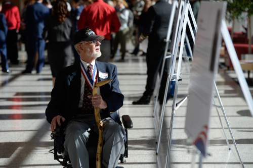 Francisco Kjolseth  |  The Salt Lake Tribune
Tom Hollingsworth, a veteran who was honored last year, attends the annual Veterans Day ceremony at the University of Utah where 11 Utah veterans were honored for their service during a ceremony at the Olpin Union Building.