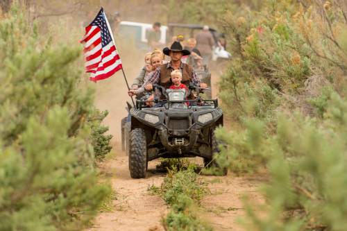 Trent Nelson  |  Tribune file photo
Ryan Bundy rides an ATV through Recapture Canyon after a call to action by San Juan County Commissioner Phil Lyman on Saturday May 10, 2014. Lyman, who is facing criminal charges for his role in the ride, says tensions that lead to confrontations can be traced in part to slow-moving federal bureaucracy. The trail was closed "temporarily" in 2007 but remains closed today, he notes.