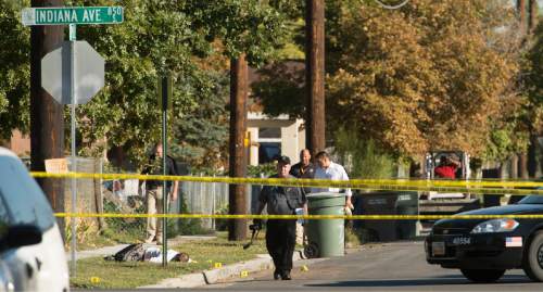 Rick Egan  |  The Salt Lake Tribune

Salt Lake City police investigate a homicide on the corner of Indiana Ave and Pueblo, Thursday, September 18, 2014
