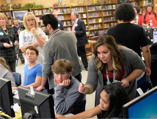 Al Hartmann  |  The Salt Lake Tribune
Thirty Kearns High School seniors apply online at the school library for Utah colleges with help from school counselors Wednesday Nov. 12 as part of Utah College Application Week.