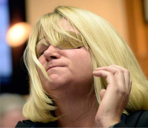 Al Hartmann  |  The Salt Lake Tribune
Kristine Biggs Johnson wears an eye patch over the eye that was shot out in November 2012 by a Morgan County Sheriff's deputy.  Her attorney Bob Sykes is filing a federal civil rights lawsuit Thursday November 13 against a Morgan County Sheriff's deputy for improper use of deadly force.  The shooting was deemed unjustified by Davis County Attorney Troy Rawlings, but no charges were filed against the deputy.
