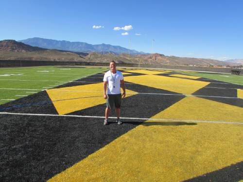 Tom Wharton  |  The Salt Lake Tribune 

Diamond Ranch football coach Rob Dias stands on the beautiful field at the southern Utah campus of 1A school.