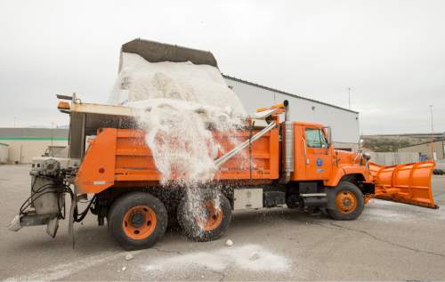 Rick Egan  |  The Salt Lake Tribune

Salt is loaded into a snow plow at the UDOT maintenance yard, during a press conference about UDOT's preparations to handle the snow this winter, Thursday, November 13, 2014