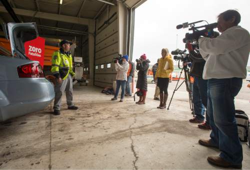 Rick Egan  |  The Salt Lake Tribune

Jeff Reynolds, state wide manager for the Incident Management Team, talks to the media about items recommended for everyone to have in their trunk for winter driving, Thursday, November 13, 2014