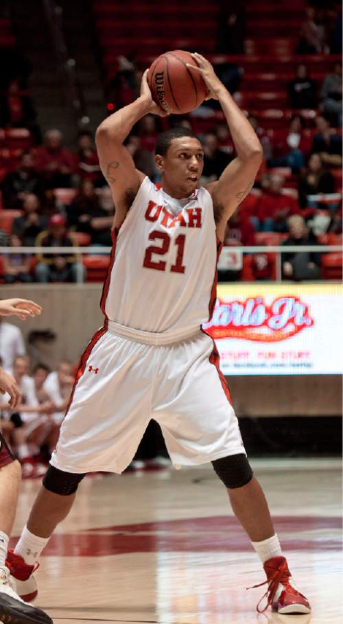 Michael Mangum  |  Special to the Tribune

Utah forward Jordan Loveridge (21) looks to make a pass during their game against the Willamette Bearcats at the Huntsman Center on Friday, November 9, 2012. Loveridge led the team with 10 rebounds and 18 points as the Utes beat the Bearcats 104-47.