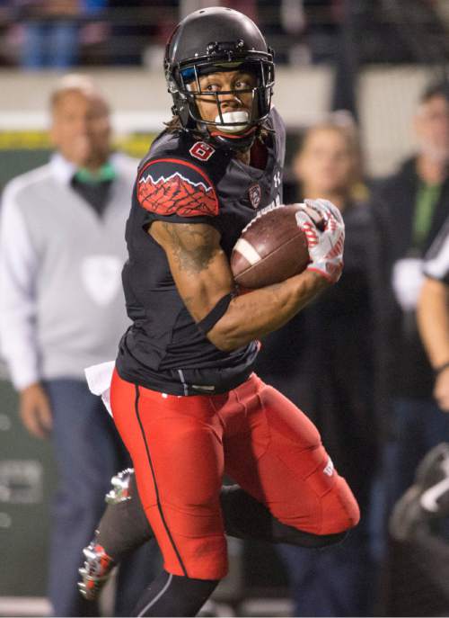 Utah Utes wide receiver Kaelin Clay (8) runs for the end zone on a long pass play, but dropped the ball before he reached the end zone, resulting in an a 99-yard Oregon touchdown, in PAC-12 action, Utah vs. Oregon game, at Rice-Eccles Stadium, Saturday, Nov. 8, 2014. (AP Photo/The Salt Lake Tribune, Rick Egan)