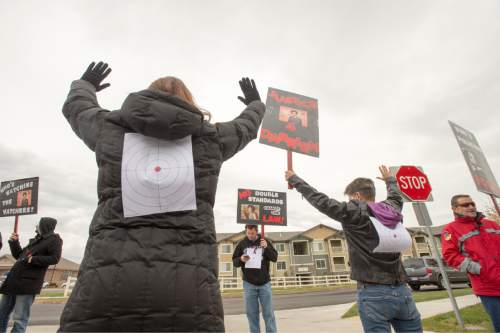 Rick Egan  |  The Salt Lake Tribune

Supporters chant during a rally in front of the Saratoga Springs Police station, for justice for Darrien Hunt, who was fatally shot by two Saratoga Springs police officers on Sept. 10, 2014, after allegedly swinging a samurai-type sword at the officers.Friday, November 14, 2014