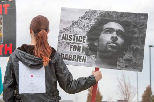 Rick Egan  |  The Salt Lake Tribune

A supporters wear a target on her back  during a rally in  Saratoga Springs for justice for Darrien Hunt, Friday, November 14, 2014