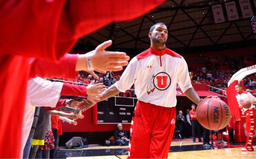 Leah Hogsten  |  The Salt Lake Tribune
The University of Utah players warm up during their home opener at the Jon M. Huntsman Center in Salt Lake City, November 14, 2014.