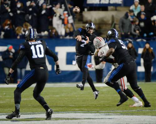 Steve Griffin  |  The Salt Lake Tribune

Brigham Young Cougars quarterback Christian Stewart (7) fires a pass to Brigham Young Cougars wide receiver Mitch Mathews during first half action in the BYU versus UNLV football game at LaVell Edwards Stadium in Provo, Saturday, November 15, 2014.