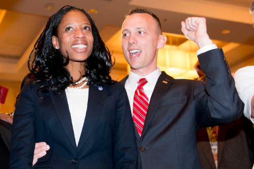Steve Griffin  |  The Salt Lake Tribune

Mia Love celebrates with her husband Jason after defeating opponent Doug Owens in the race for Utah's 4th Congressional District, Tuesday November 4, 2014.