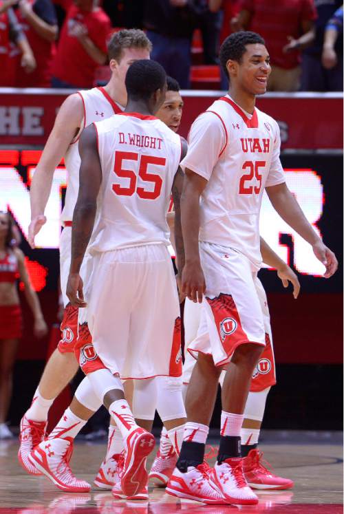 Leah Hogsten  |  The Salt Lake Tribune
Utah Utes guard Kenneth Ogbe (25) smiles at the bench and their reaction. The University of Utah defeated Ball State University 90-72 during their home opener at the Jon M. Huntsman Center in Salt Lake City, November 14, 2014.