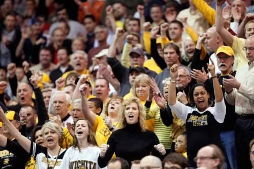 Trent Nelson  |  The Salt Lake Tribune

Wichita fans cheer as the Shockers lead Gonzaga in the first half in the NCAA tournament at EnergySolutions Arena on Saturday, March 23, 2013.