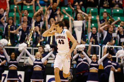 Scott Sommerdorf  |  The Salt Lake Tribune

Gonzaga Bulldogs guard Drew Barham (43) celebrates a three pointer as the Bulldogs face the Shockers in the NCAA tournament at EnergySolutions Arena on Saturday, March 23, 2013.