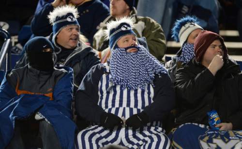 Steve Griffin  |  The Salt Lake Tribune

BYU fans brave the cold as they watch the Cougars pull away from UNLV during second half action at LaVell Edwards Stadium in Provo, Saturday, November 15, 2014.