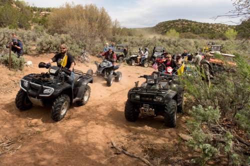 Trent Nelson  |  The Salt Lake Tribune
Motorized vehicles cross into a restricted area of Recapture Canyon, which has been closed to motorized use since 2007, after a call to action by San Juan County Commissioner Phil Lyman. Saturday May 10, 2014 north of Blanding.