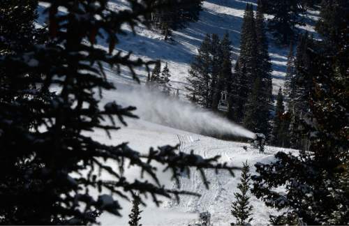 Scott Sommerdorf  |  The Salt Lake Tribune
A snow-making machine churns away at Solitude Ski Resort, Sunday, November 16, 2014. Utah ski resorts are looking to open this next week, before the Thanksgiving holiday, but most of the base will be machine-made snow.
