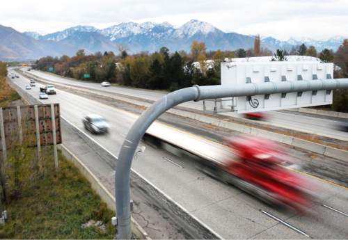 Steve Griffin  |  The Salt Lake Tribune

Traffic on I-80 near 1700 east  in Salt Lake City, Friday, November 14, 2014.