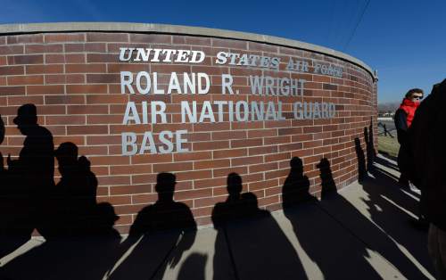 Francisco Kjolseth  |  The Salt Lake Tribune
Long shadows are cast by those visiting the Utah Air National Guard Base east of SLC International that was renamed for retired Brig. Gen. Roland Wright, who flew the "Mormon Mustang" during World War II.