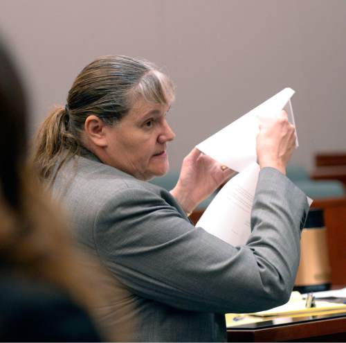 Al Hartmann  |  The Salt Lake Tribune
Mary Corporon, defense lawyer for Stephanie Sloop, charged with aggravated murder in the death of her son, Ethan Stacy, speaks to the plea agreement in Judge Thomas Kay's courtroom in Farmington Monday November 17, 2014.  It was scheduled as a preliminary hearing but Sloop ended up pleading guilty to aggravated murder and obstruction of justice which the judge and prosecution accepted.  She was sentenced to 20 years to life.