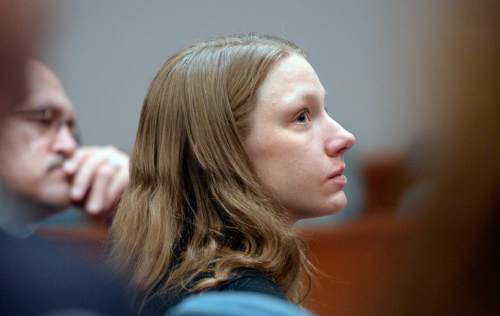 Al Hartmann  |  The Salt Lake Tribune
Stephanie Sloop, charged with aggravated murder in the death of her son, Ethan Stacy, listens to prosecutors' statement in Judge Thomas Kay's courtroom in Farmington Monday November 17, 2014.  It was scheduled as a preliminary hearing but she ended up pleading guilty to aggravated murder and obstruction of justice which the judge and prosecution accepted.  She was sentenced to 20 years to life.