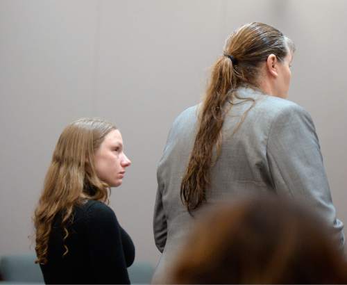 Al Hartmann  |  The Salt Lake Tribune
Stephanie Sloop, charged with aggravated murder in the death of her son, Ethan Stacy, stands with her defense lawyer Mary Corporon in Judge Thomas Kay's courtroom in Farmington Monday November 17, 2014.  It was scheduled as a preliminary hearing but she ended up pleading guilty to aggravated murder and obstruction of justice which the judge and prosecution accepted.  She was sentenced to 20 years to life.