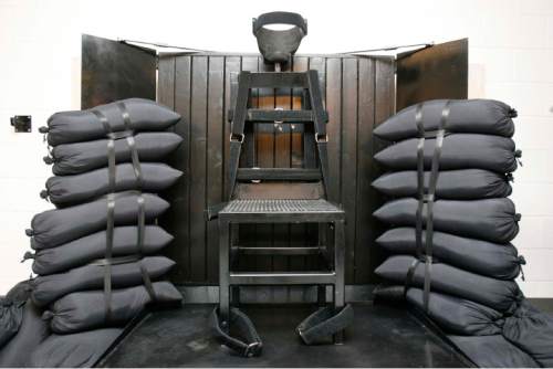 FILE - This June 18, 2010, file photo shows the firing squad execution chamber at the Utah State Prison in Draper, Utah. Ten years after banning the use of firing squads in state executions, Utah lawmakers on Wednesday, Nov. 19, 2014, endorsed a proposal to resurrect the practice in order to head off problems with the lethal injection drugs. (AP Photo/Trent Nelson, Pool, File)