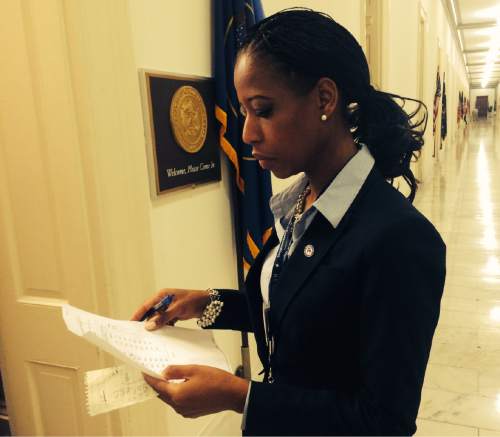 Thomas Burr  |  Tribune file photo
Rep.-elect Mia Love checks over a list of her favorite offices to pick from two weeks after winning election.