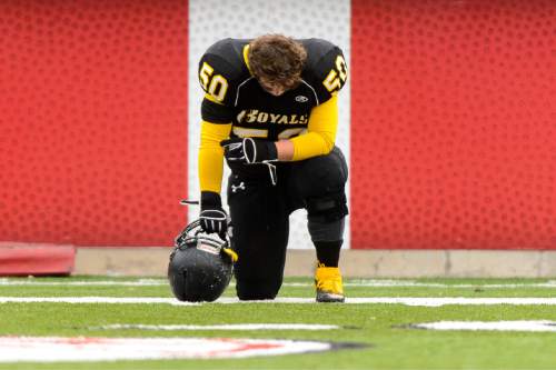 Trent Nelson  |  The Salt Lake Tribune
Roy's Bridger Gray takes a quiet moment before faceing Corner Canyon High School in a  4A state football semifinal game at Rice-Eccles Stadium in Salt Lake City, Friday November 14, 2014.