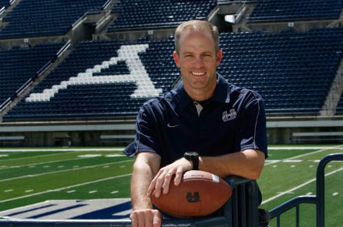 Scott Sommerdorf   |  The Salt Lake Tribune
USU head football coach Matt Wells at Romney Stadium in Logan, Thursday, August 1, 2013.